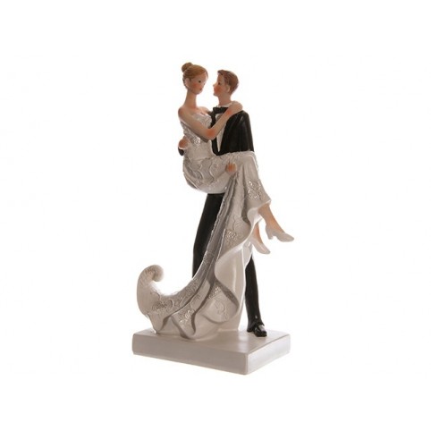 belle figurine, marié portant la mariée dans ses bras