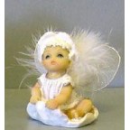 Ange figurine pour baptême, Modèle ange sur son coussin 